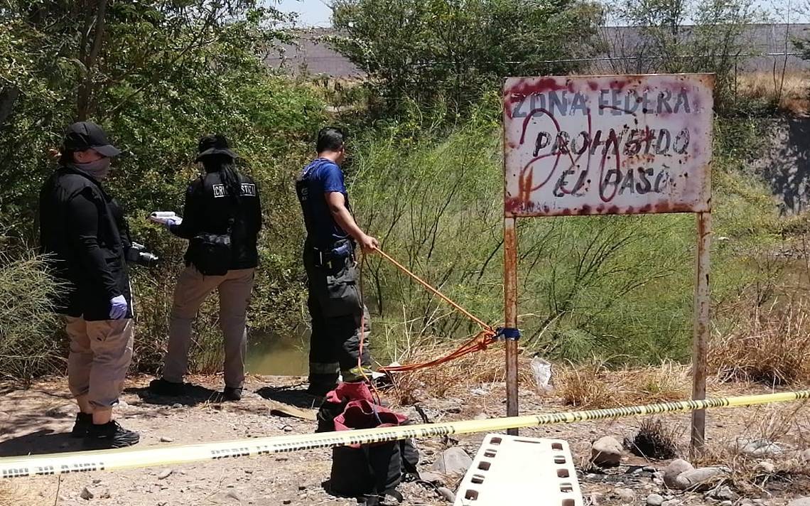 Con signos de violencia localizan cuerpo en un canal al sur de Culiacán